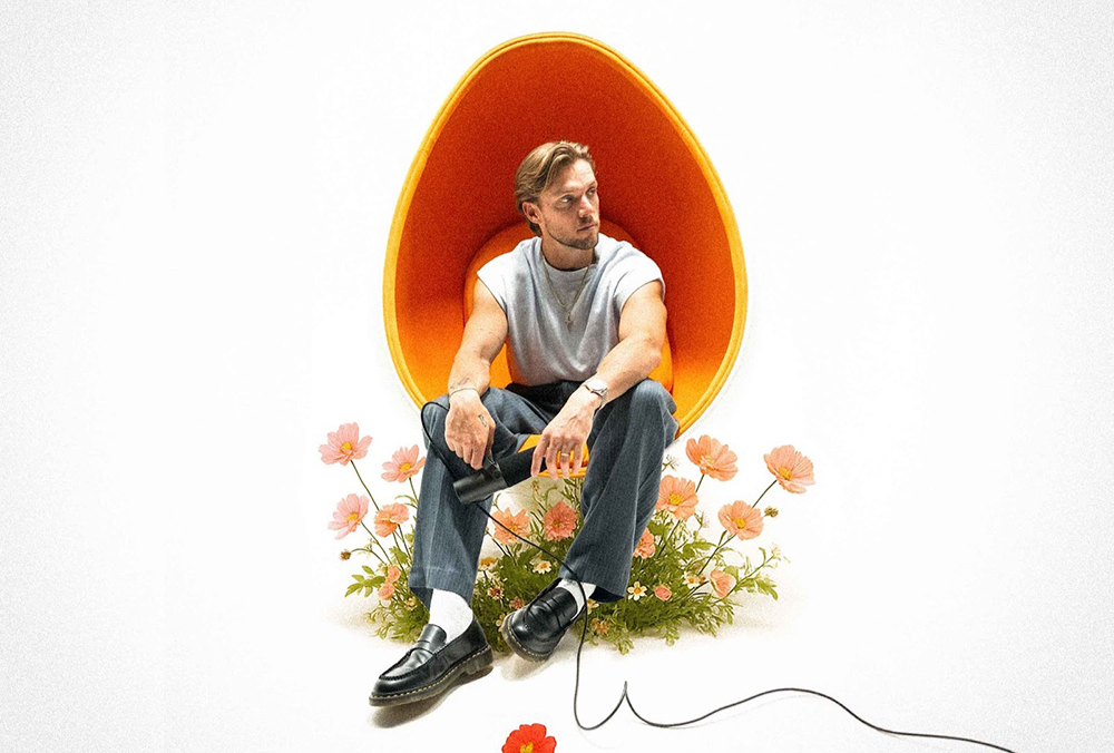 John K “Never Been In Love” Captures Euphoria and Intimacy Ahead of New Album